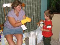Caleb and Mommy playing w/ baby stuff